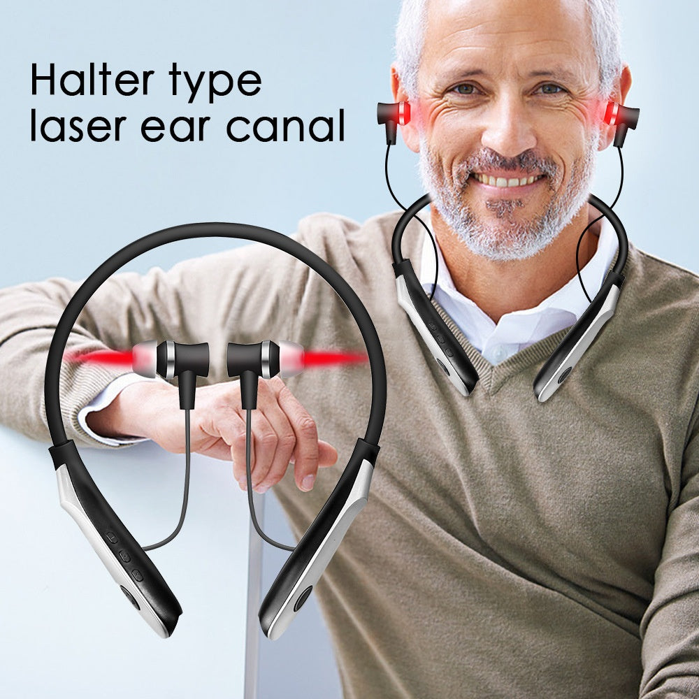 Older male wearing device around neck with red laser beams emitting from ear canals, smiling confidently