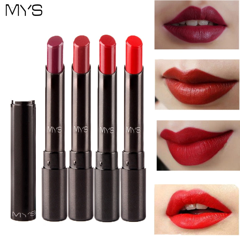 Close-up of red matte lipstick with black tube shown at angle