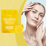 Hoygi Facial Glow Glow Up Pads 40-piece yellow pouch with golden liquid essence droplets and ingredient visuals (turmeric, lemon, ginger)