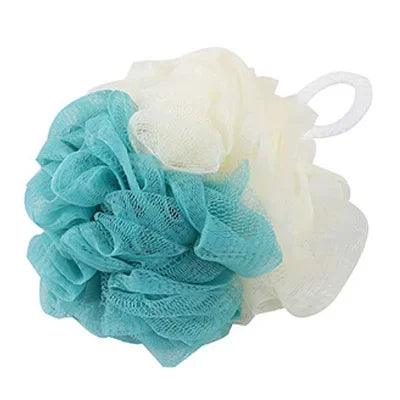 Dual-texture mesh loofah in teal and cream showing exfoliating power