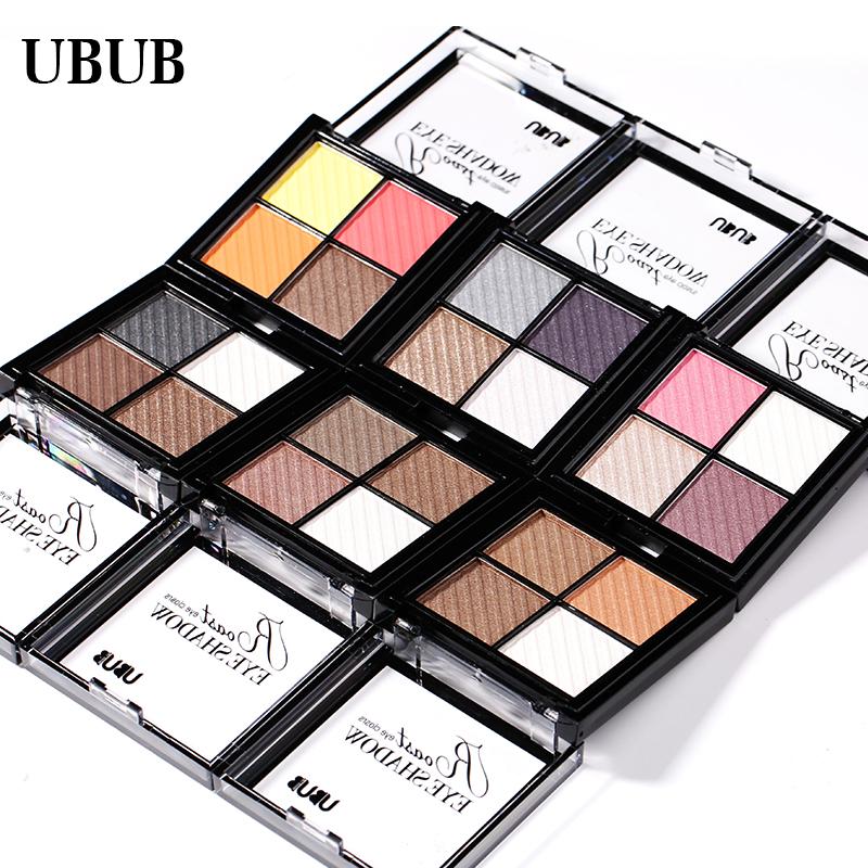 Flat-lay of multiple UBUB eyeshadow palettes arranged showing diverse color stories including warm neutrals, cool tones, and colorful options
