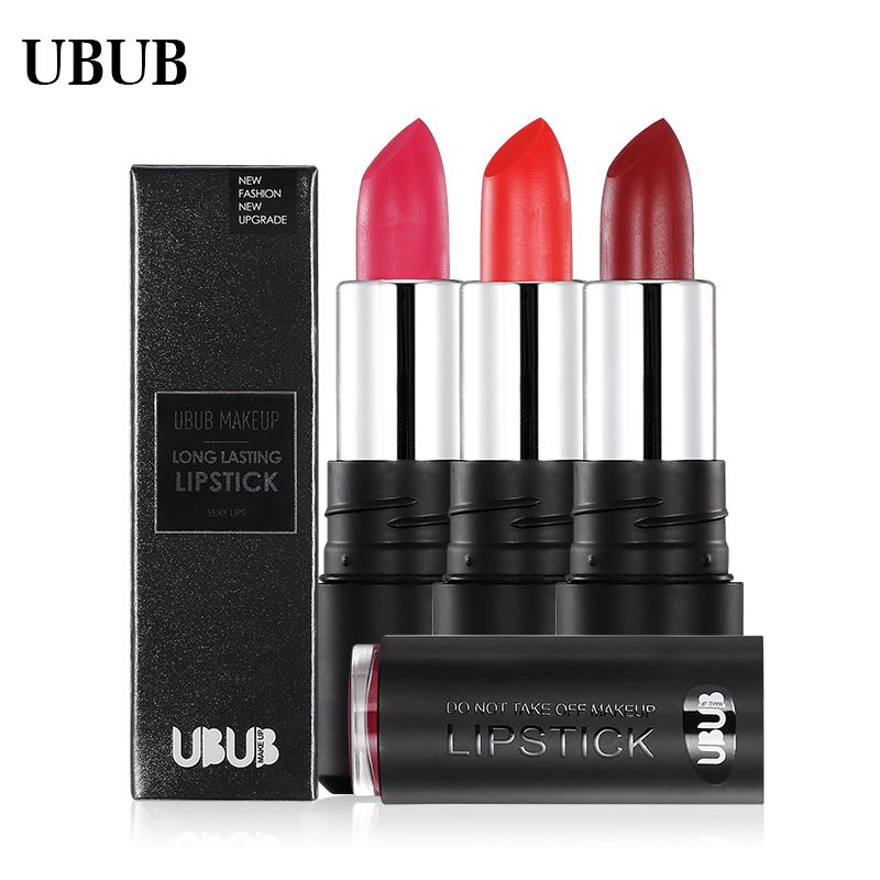 Single UBUB lipstick in deep burgundy shade with swatch swipe showing color and texture application
