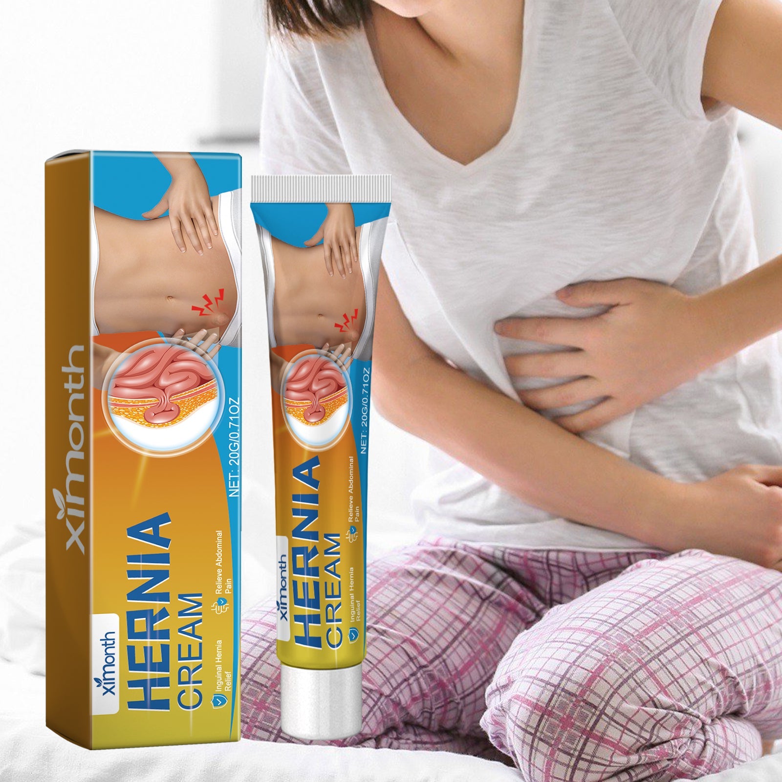 Woman in white t-shirt applying cream to abdominal area with product and packaging visible beside her
