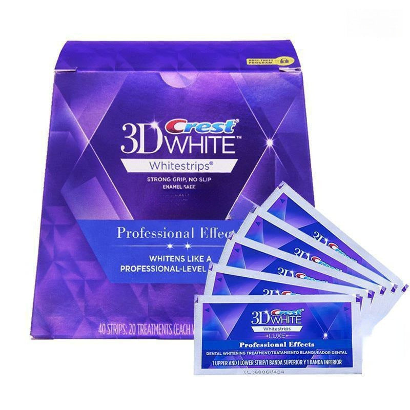 Front view of Crest 3D White Whitestrips Professional Effects box in deep purple with geometric pattern, gold enhanced seal
