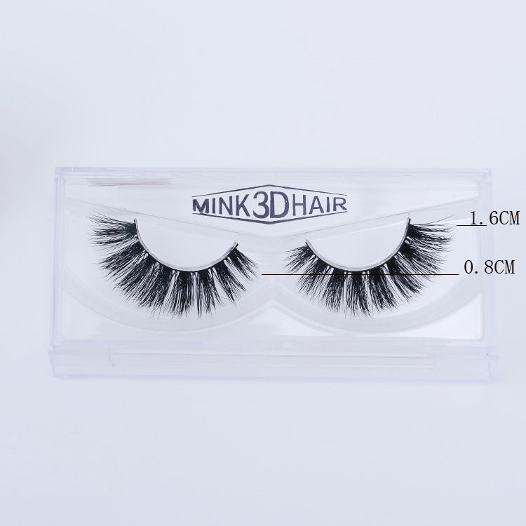 Close-up of full lash pair showing dense wispy fibers with natural-looking taper and dramatic volume