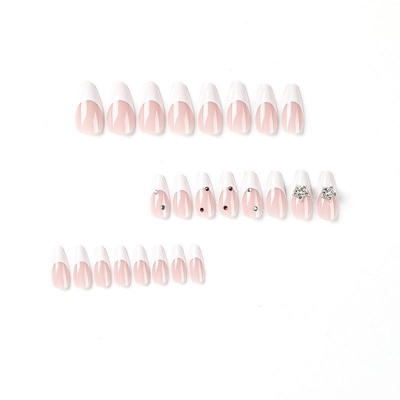 Organized display of complete nail set showing 24 nails in 3 rows with varying embellishment styles