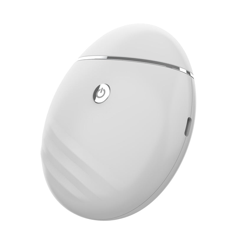 Side view of white egg-shaped device with chrome band and power button