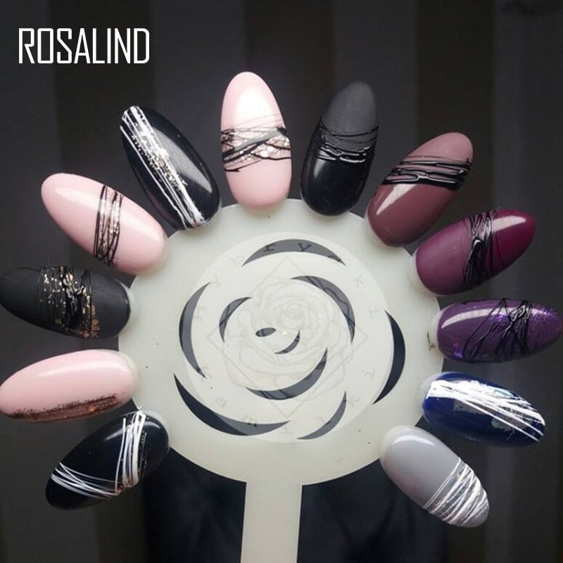 Circular display of spider gel nail art designs arranged around ROSALIND logo showing multiple color and design combinations