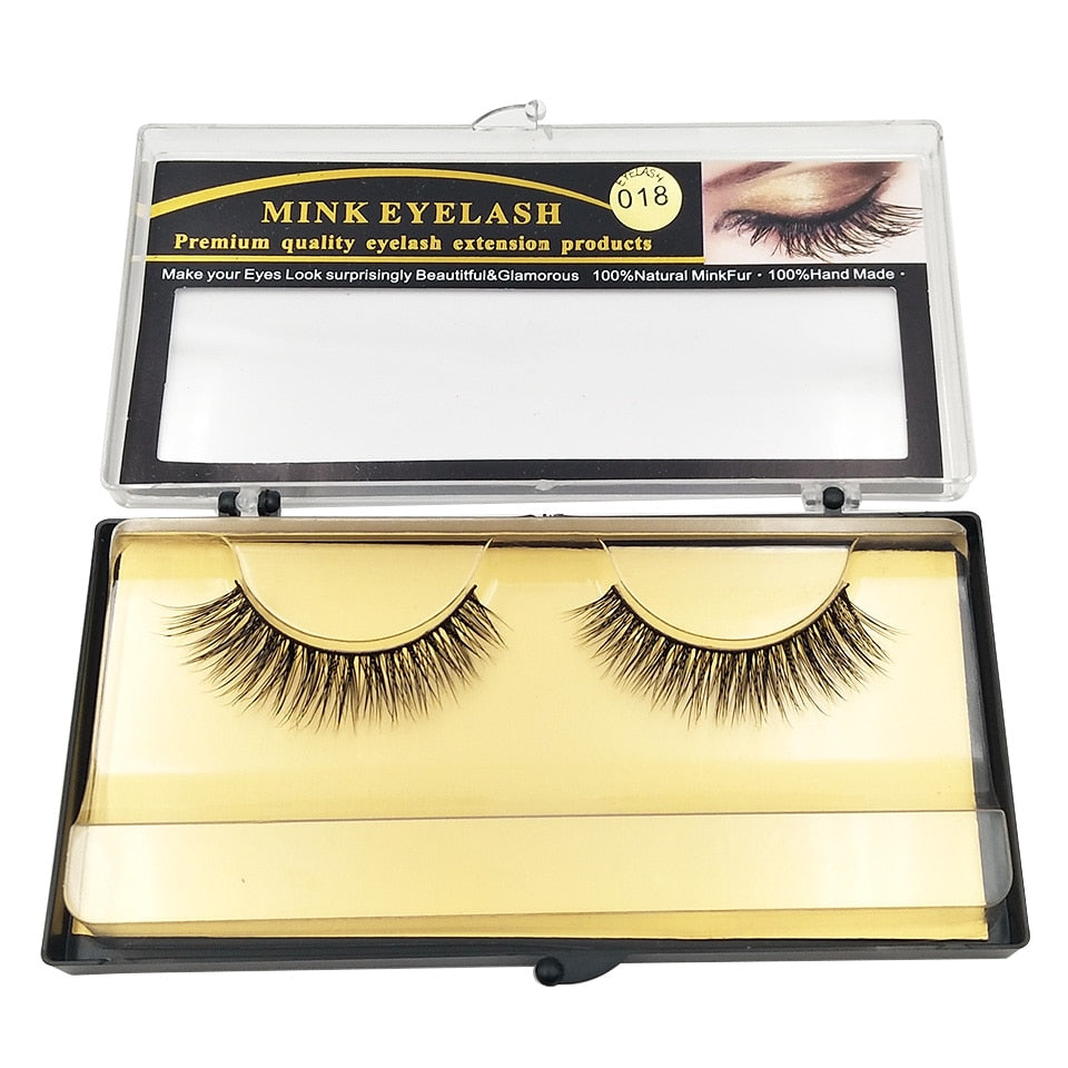 Full open case display with lashes nested in cream colored silk padding, showing protective storage and professional presentation from above