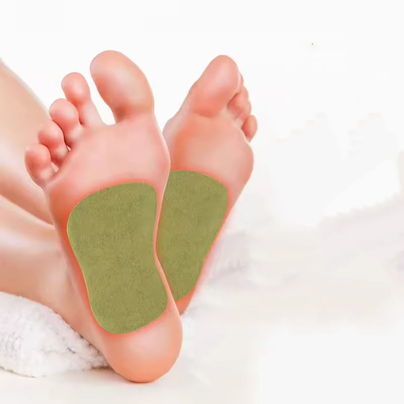 Close-up of foot showing patch application with heat-wave visualization overlay in gold/yellow