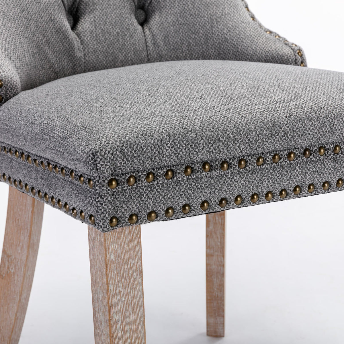 Tufted Grey Linen Dining Chair with Brass Nailhead Trim