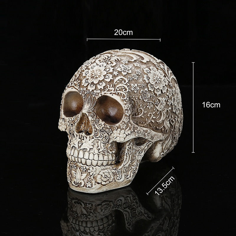 Carved Skull Sculpture with Antique Floral Relief Decor