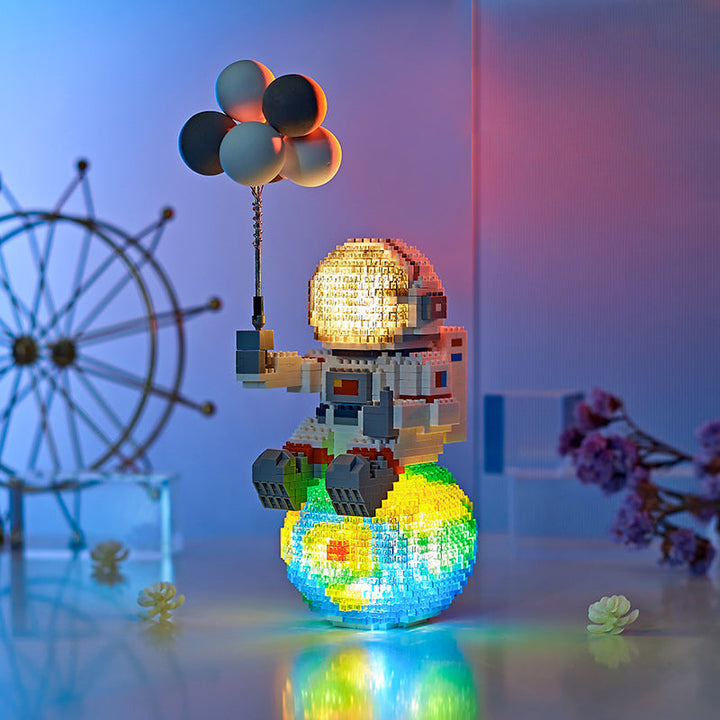 Astronaut Micro Building Blocks for Glowing Displays