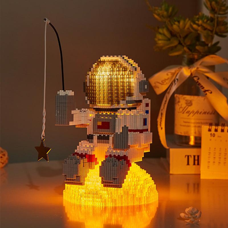 Astronaut Micro Building Blocks for Glowing Displays