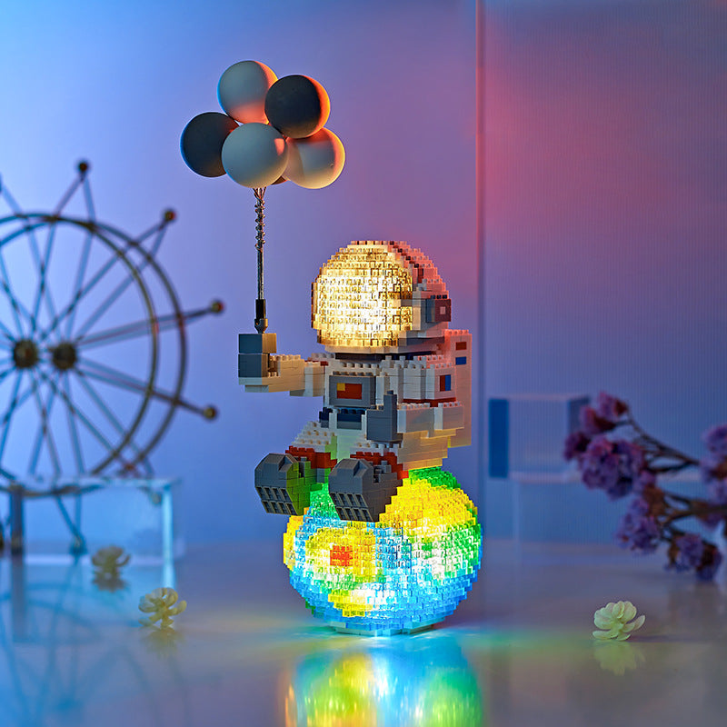 Astronaut Micro Building Blocks for Glowing Displays