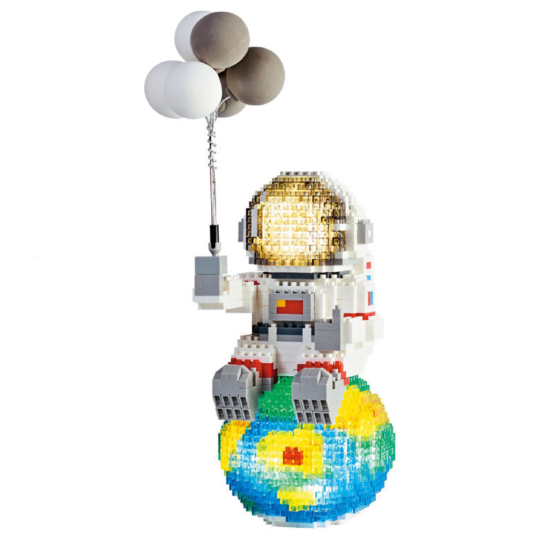 Astronaut Micro Building Blocks for Glowing Displays