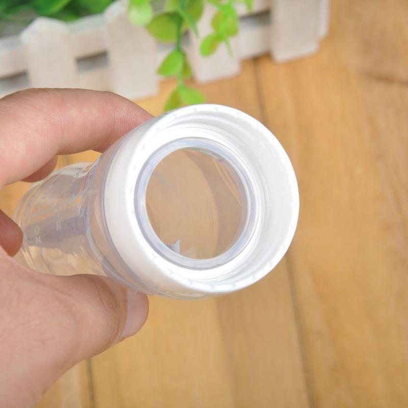 Silicone Baby Feeding Bottle With Spoon For Less Mess