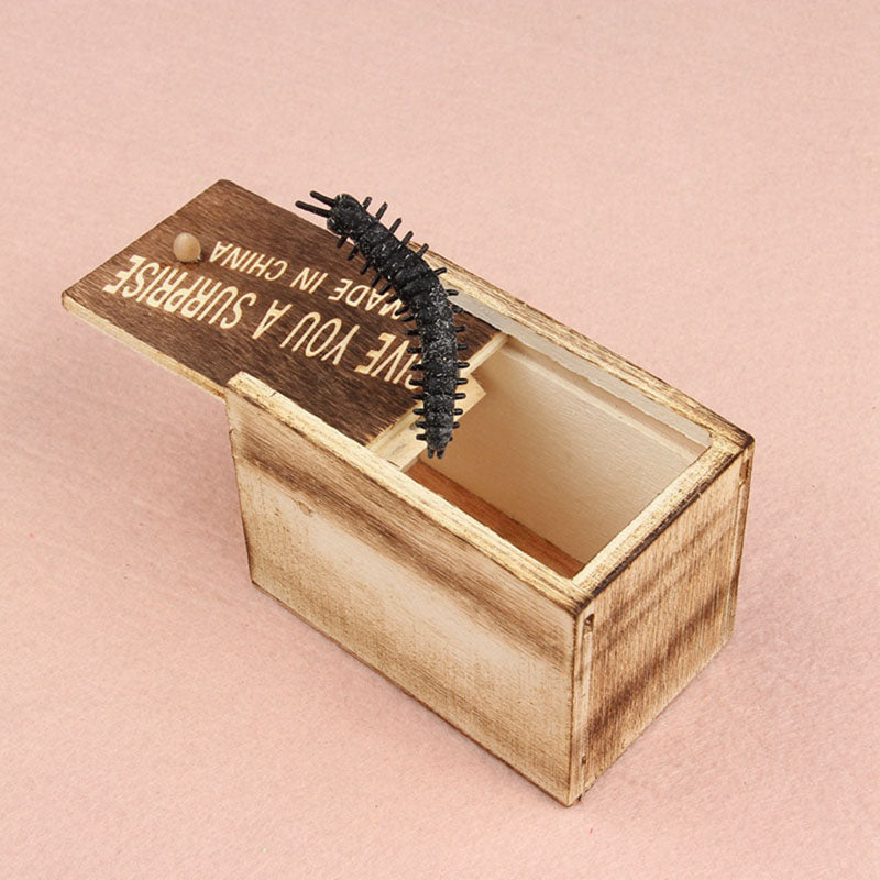 Wooden Prank Box with Lifelike Spring-Loaded Insect