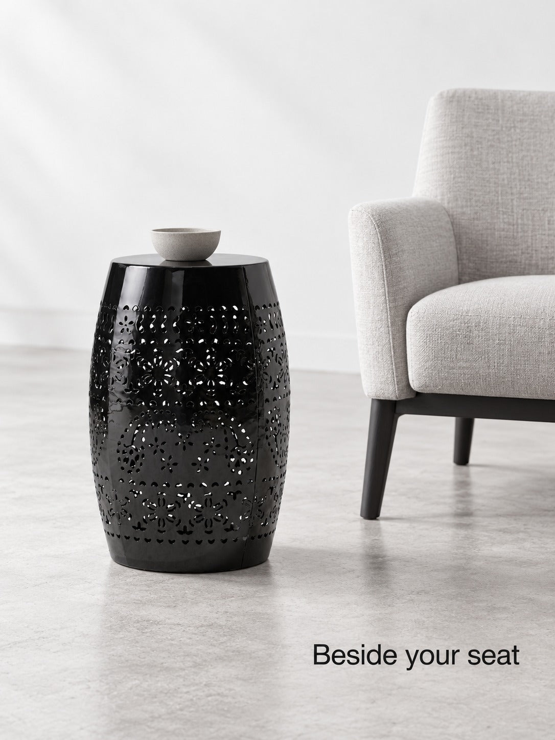 Black Ceramic Side Table with Floral Cutout Design