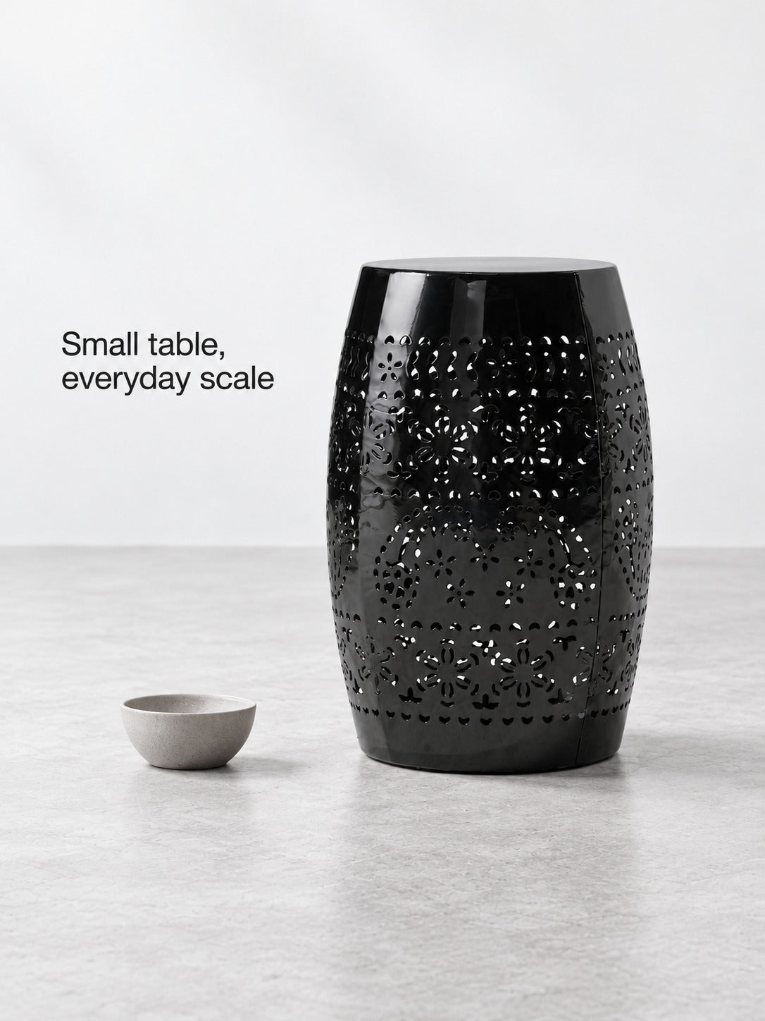 Black Ceramic Side Table with Floral Cutout Design