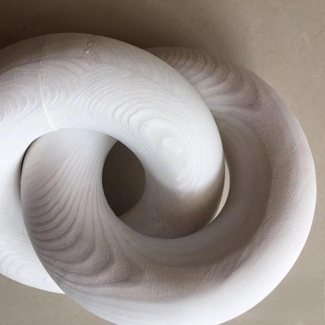 Interlocking Wooden Decor for Natural Sculptural Warmth